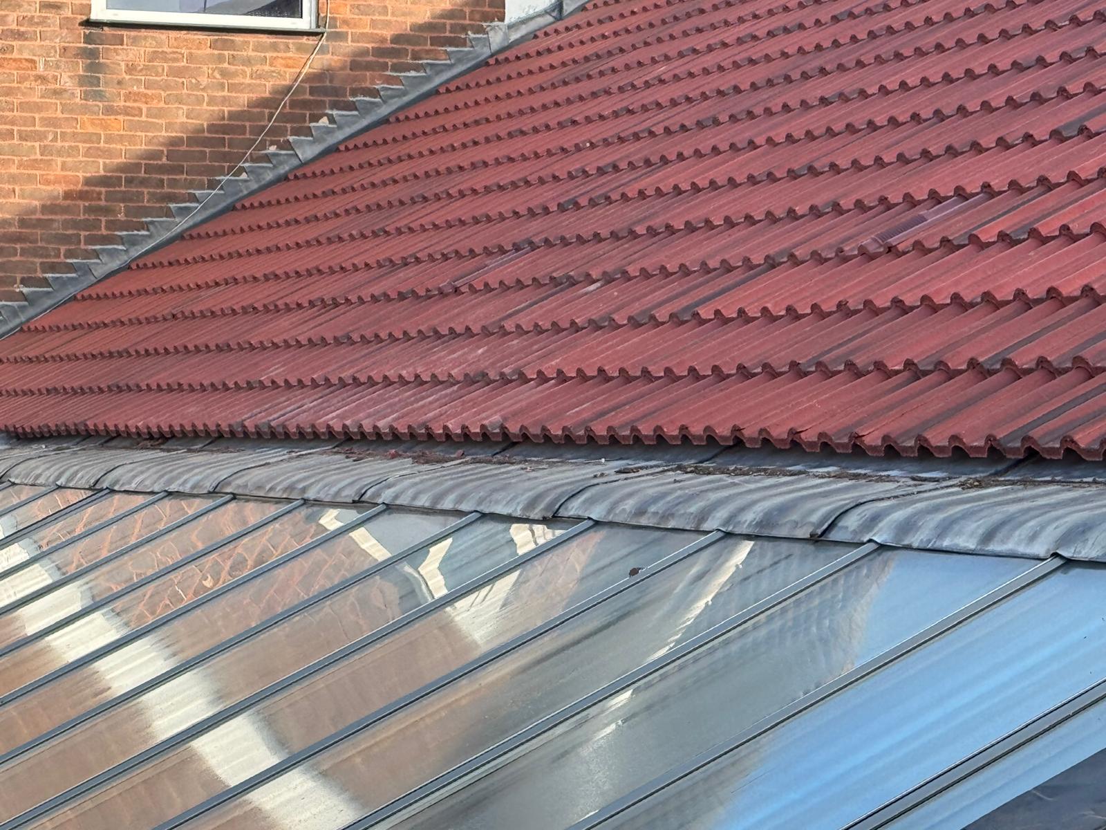 How Do You Clean High-Access Glass Roofs Safely?